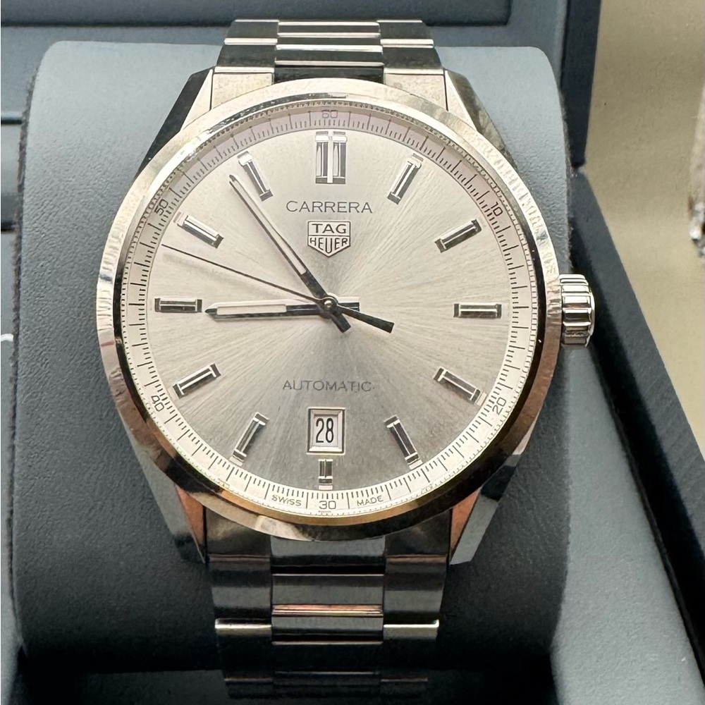 TAG Heuer Silver Watch with Stainless Steel Band and Date Window